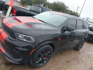 2023 Dodge Durango SRT Hellcat Premium with VIN 1C4SDJH99PC584770, listed as a IAAI auction lot 41562157 with 14,598 mi miles and . Bid and sale history available at DreamBid. Image 17.