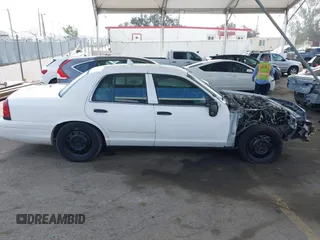 2009 Ford Police Interceptor with VIN 2FAHP71V29X129265, listed as a IAAI auction lot 42381382 with Not provided miles and . Bid and sale history available at DreamBid. Image 13.