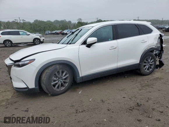 2021 Mazda CX-9 Touring with VIN JM3TCBCY1M0517709, listed as a Copart auction lot 57624945 with 64,081 mi miles and Salvage title. Bid and sale history available at DreamBid. Image 1.
