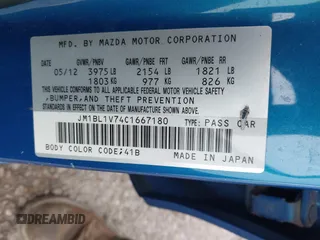 2012 Mazda 3 i Touring z VIN JM1BL1V74C1667180, wystawiony jako IAAI lot #41953161 z przebiegiem 174 802 mil mil oraz . Historia ofert i sprzedaży dostępna na DreamBid. Obrazek 9.