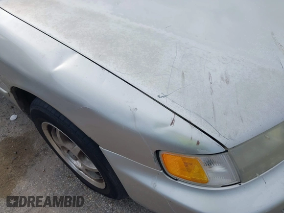 1996 Honda Accord Value with VIN 1HGCD5690TA212711, listed as a IAAI auction lot 42035289 with 184,592 mi miles and . Bid and sale history available at carsss.com. Image 12.
