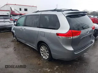 2013 Toyota Sienna XLE with VIN 5TDDK3DC5DS070243, listed as a IAAI auction lot 41162661 with 149,672 mi miles and . Bid and sale history available at DreamBid. Image 3.