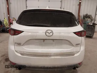 2018 Mazda CX-5 S Premium with VIN JM3KFBDM1J1412088, listed as a IAAI auction lot 41497431 with 65,532 mi miles and . Bid and sale history available at DreamBid. Image 16.
