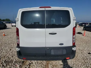 2018 Ford Transit with VIN 1FTYR1YM7JKB32779, listed as a Copart auction lot 55868195 with 112,354 mi miles and Salvage title. Bid and sale history available at DreamBid. Image 6.
