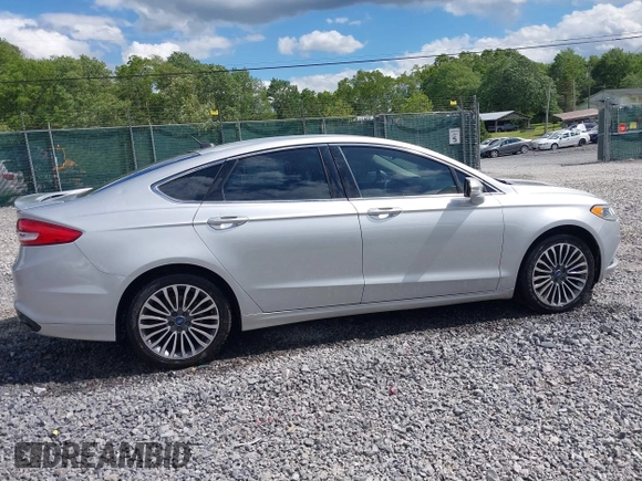 2017 Ford Fusion Titanium with VIN 3FA6P0K99HR112234, listed as a IAAI auction lot 42332700 with 106,685 mi miles and . Bid and sale history available at DreamBid. Image 13.