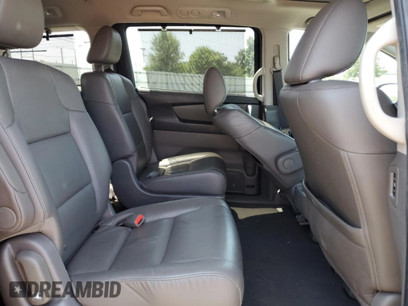 2014 Honda Odyssey Touring с VIN 5FNRL5H91EB013332, выставлен на аукционе Copart как лот 59414015 с пробегом 162 203 миль миль и Списание • Salvage title. История ставок и продаж доступна на DreamBid. Изображение 11.