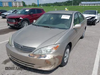 2003 Toyota Camry LE with VIN 4T1BE32K13U243738, listed as a IAAI auction lot 42120647 with Not Provided miles and . Bid and sale history available at DreamBid. Image 2.