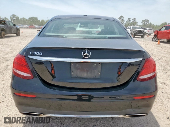 2017 Mercedes-Benz E 300 Luxury with VIN WDDZF4JB8HA123652, listed as a Copart auction lot 57050205 with 105,048 mi miles and Salvage title. Bid and sale history available at DreamBid. Image 6.
