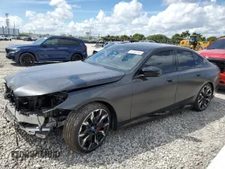 2024 BMW i5 M60 with VIN WBY43FK00RCR71826, listed as a Copart auction lot 72140144 with 5,987 mi miles and Salvage Title. Bid and sale history available at carsss.com. Image 1.