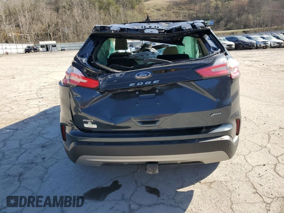 2024 Ford Edge SEL z VIN 2FMPK4J97RBA27846, wystawiony jako Copart lot #49391255 z przebiegiem Nie podano mil oraz Szkoda całkowita • Salvage title. Historia ofert i sprzedaży dostępna na DreamBid. Obrazek 6.
