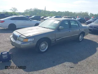 2000 Mercury Grand Marquis LS с VIN 2MEFM75WXYX671286, выставлен на аукционе IAAI как лот 42158291 с пробегом 87 223 миль миль и . История ставок и продаж доступна на DreamBid. Изображение 2.
