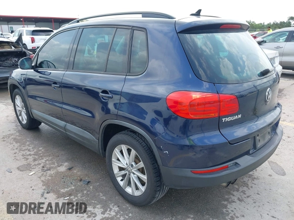 2015 Volkswagen Tiguan SE with VIN WVGAV7AX1FW508313, listed as a IAAI auction lot 42120704 with 136,405 mi miles and . Bid and sale history available at DreamBid. Image 3.