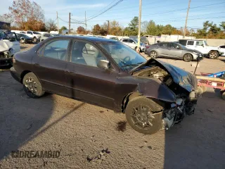 1999 Hyundai Elantra z VIN KMHJF25F9XU833791, wystawiony jako Copart lot #77899654 z przebiegiem 60 396 mil mil oraz Szkoda całkowita • Salvage title. Historia ofert i sprzedaży dostępna na DreamBid. Obrazek 4.