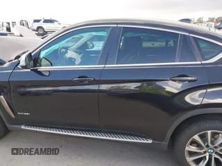 2016 BMW X6 xDrive35i z VIN 5UXKU2C50G0N83968, wystawiony jako IAAI lot #41958971 z przebiegiem 70 738 mil mil oraz . Historia ofert i sprzedaży dostępna na DreamBid. Obrazek 14.