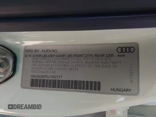 2018 Audi A3 Sedan Premium with VIN WAUAUGFF5J1052777, listed as a IAAI auction lot 41913349 with 82,977 mi miles. Bid and sale history available at carsss.com. Image 9.