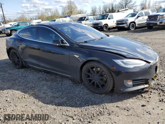 2016 Tesla Model S 90D with VIN 5YJSA1E2XGF150490, listed as a Copart auction lot 51070365 with 144,457 mi miles and Salvage Title. Bid and sale history available at DreamBid. Image 4.
