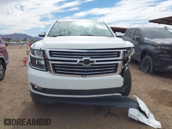 2015 Chevrolet Suburban LTZ with VIN 1GNSKKKC5FR691219, listed as a IAAI auction lot 41921973 with 169,119 mi miles and . Bid and sale history available at DreamBid. Image 12.