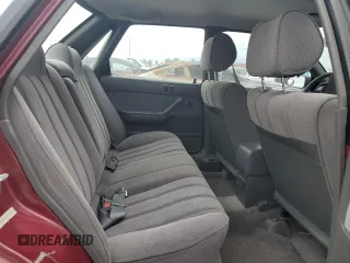 1991 Toyota Camry DLX z VIN 4T1SV21E0MU450578, wystawiony jako Copart lot #73990024 z przebiegiem 149 342 mil mil oraz Czysty tytuł • Clean title. Historia ofert i sprzedaży dostępna na DreamBid. Obrazek 10.