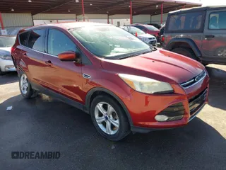 2014 Ford Escape SE z VIN 1FMCU9G91EUD65826, wystawiony jako IAAI lot #41772617 z przebiegiem 158 105 mil mil oraz . Historia ofert i sprzedaży dostępna na DreamBid. Obrazek 1.