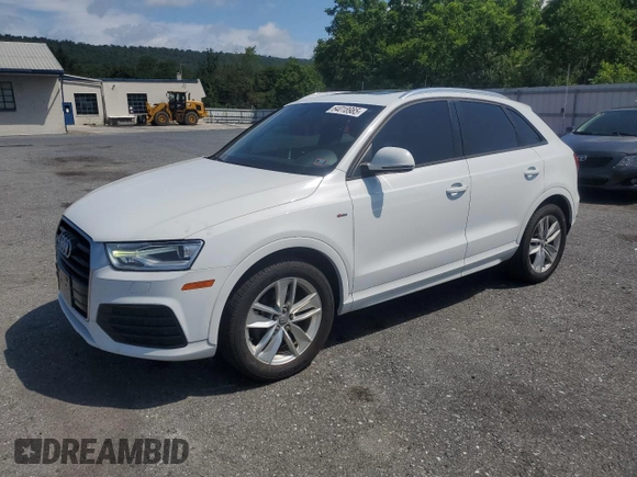 2018 Audi Q3 Premium with VIN WA1ECCFS8JR024576, listed as a Copart auction lot 64018985 with 128,784 mi miles and Clean title. Bid and sale history available at DreamBid. Image 1.