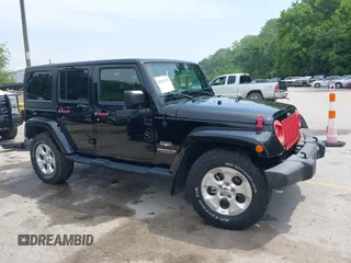 2015 Jeep Wrangler Unlimited Sahara with VIN 1C4BJWEG8FL712049, listed as a IAAI auction lot 42389119 with 112,639 mi miles and . Bid and sale history available at DreamBid. Image 1.
