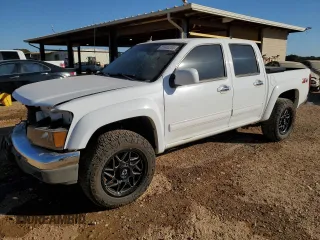 2012 Chevrolet Colorado z VIN 1GCHTDFP5C8108481, wystawiony jako Copart lot #77945234 z przebiegiem 104 997 mil mil oraz Szkoda całkowita • Salvage title. Historia ofert i sprzedaży dostępna na DreamBid. Obrazek 1.