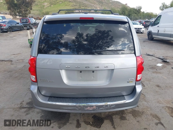 2016 Dodge Grand Caravan SXT with VIN 2C4RDGCG9GR180396, listed as a IAAI auction lot 41921312 with 130,256 mi miles and . Bid and sale history available at DreamBid. Image 17.