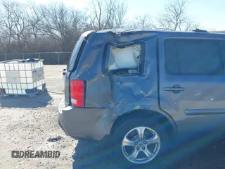 2014 Honda Pilot EX-L with VIN 5FNYF4H50EB050091, listed as a IAAI auction lot 41821874 with 133,407 mi miles. Bid and sale history available at carsss.com. Image 19.