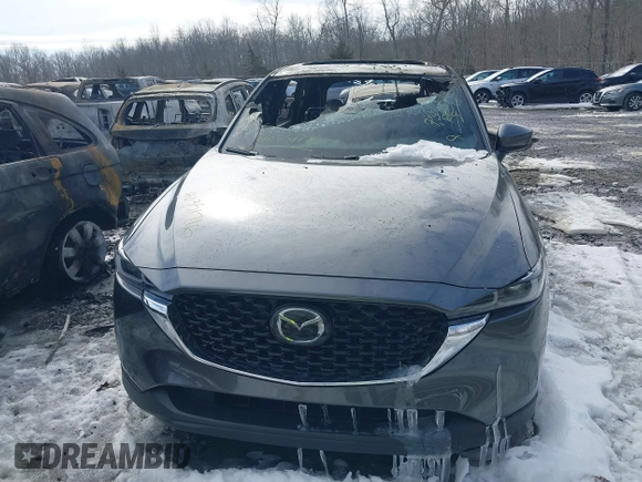 2023 Mazda CX-5 2.5 S Premium Package with VIN JM3KFBDM5P0267412, listed as a IAAI auction lot 40351716 with 7,306 mi miles. Bid and sale history available at carsss.com. Image 12.