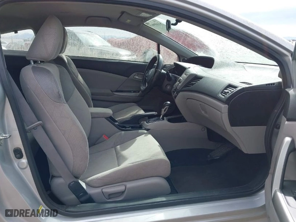2012 Honda Civic Cpe LX with VIN 2HGFG3B52CH518905, listed as a IAAI auction lot 41689019 with 272,657 mi miles. Bid and sale history available at carsss.com. Image 5.