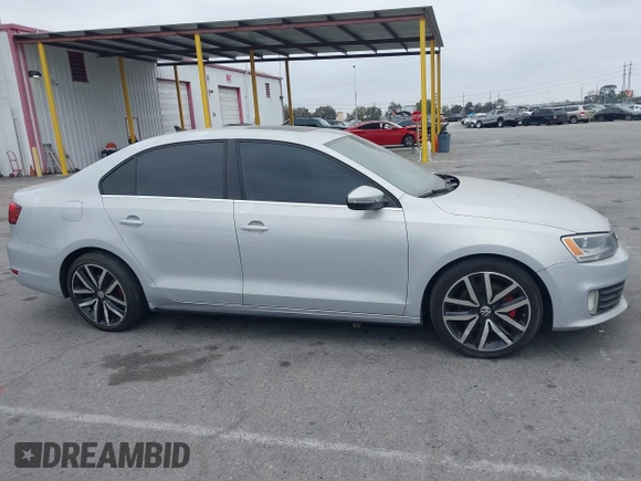 2012 Volkswagen Jetta GLI Autobahn with VIN 3VW4A7AJ1CM450205, listed as a IAAI auction lot 42421504 with 130,602 mi miles and . Bid and sale history available at DreamBid. Image 13.
