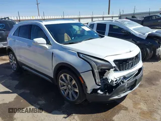 2022 Cadillac XT4 FWD Premium Luxury z VIN 1GYFZCR41NF169224, wystawiony jako IAAI lot #41864717 z przebiegiem 34 183 mil mil oraz . Historia ofert i sprzedaży dostępna na DreamBid. Obrazek 1.
