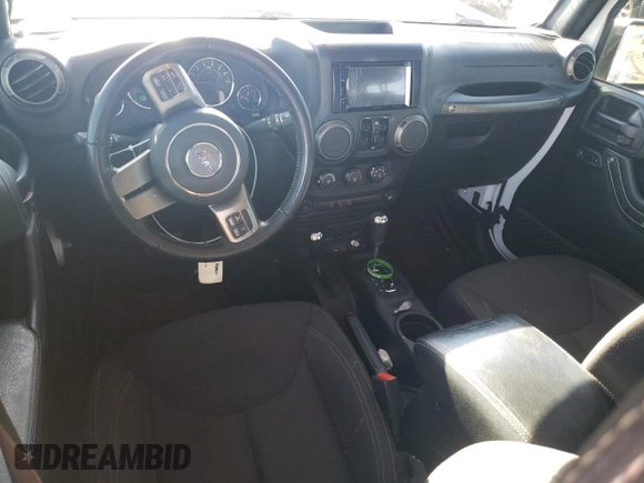 2018 Jeep Wrangler JK Unlimited Sport S with VIN 1C4BJWDG2JL913150, listed as a Copart auction lot 79956974 with 86,153 mi miles and Salvage Title. Bid and sale history available at carsss.com. Image 8.