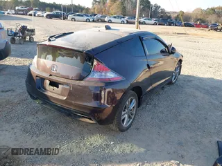 2013 Honda CR-Z with VIN JHMZF1D43DS002794, listed as a IAAI auction lot 41015432 with 133,343 mi miles. Bid and sale history available at carsss.com. Image 4.