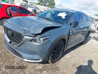 2021 Mazda CX-9 Grand Touring with VIN JM3TCADY7M0528223, listed as a IAAI auction lot 42395861 with 57,767 mi miles and . Bid and sale history available at DreamBid. Image 17.