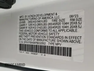 2023 Honda Passport Elite with VIN 5FNYF8H06PB032502, listed as a Copart auction lot 75814814 with 13,070 mi miles and Salvage Title. Bid and sale history available at carsss.com. Image 12.
