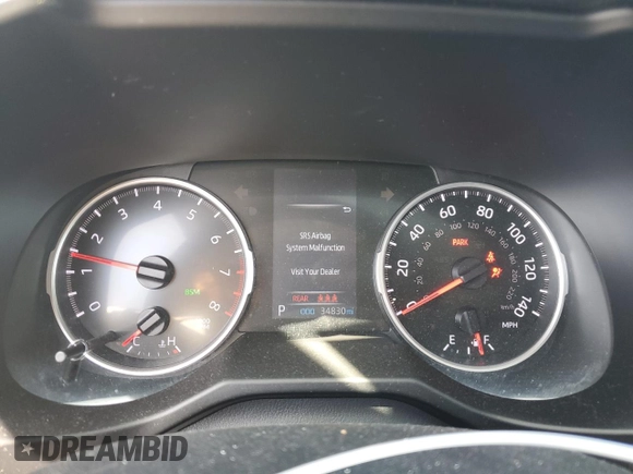 2020 Toyota RAV4 XLE with VIN 2T3W1RFV2LW074325, listed as a Copart auction lot 58693665 with 34,830 mi miles and Salvage title. Bid and sale history available at DreamBid. Image 9.