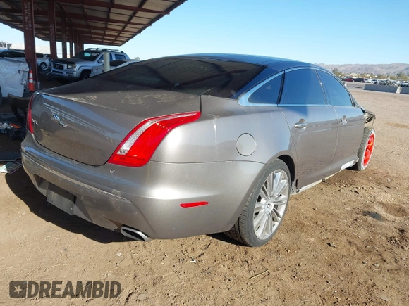 2011 Jaguar XJ XJL with VIN SAJWA2GB0BLV13469, listed as a IAAI auction lot 41836620 with 115,924 mi miles and . Bid and sale history available at DreamBid. Image 4.