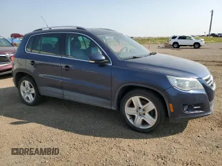 2011 Volkswagen Tiguan SEL with VIN WVGBV7AX1BW504132, listed as a Copart auction lot 64467484 with Not Provided miles and Salvage Title. Bid and sale history available at DreamBid. Image 4.