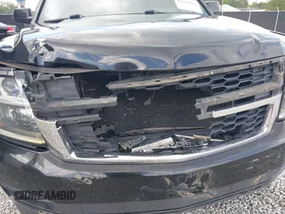 2015 Chevrolet Tahoe LS z VIN 1GNSCAKC5FR101933, wystawiony jako IAAI lot #42242415 z przebiegiem 185 191 mil mil oraz . Historia ofert i sprzedaży dostępna na DreamBid. Obrazek 6.