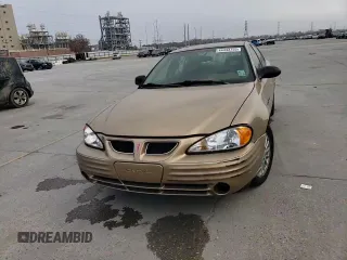 1999 Pontiac Grand Am SE2 with VIN 1G2NE52T2XM869508, listed as a Copart auction lot 44443755 with 119,769 mi miles and Salvage Title. Bid and sale history available at carsss.com. Image 10.