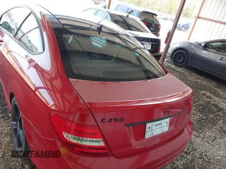 2014 Mercedes-Benz C-Class C 250 with VIN WDDGJ4HB8EG292493, listed as a IAAI auction lot 42032308 with 117,183 mi miles. Bid and sale history available at carsss.com. Image 16.
