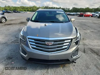 2019 Cadillac XT5 Luxury FWD z VIN 1GYKNCRS3KZ139886, wystawiony jako Copart lot #62167155 z przebiegiem 96 251 mil mil oraz Szkoda całkowita • Salvage title. Historia ofert i sprzedaży dostępna na DreamBid. Obrazek 5.