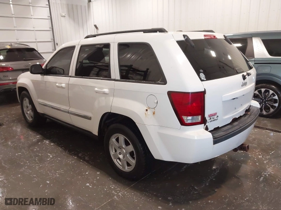 2010 Jeep Grand Cherokee Laredo with VIN 1J4PR4GK1AC143486, listed as a IAAI auction lot 41761763 with 159,139 mi miles. Bid and sale history available at carsss.com. Image 3.