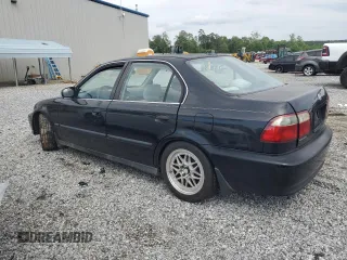 2000 Honda Civic LX z VIN 1HGEJ6670YL054677, wystawiony jako Copart lot #57126335 z przebiegiem 155 471 mil mil oraz Szkoda całkowita • Salvage title. Historia ofert i sprzedaży dostępna na DreamBid. Obrazek 2.