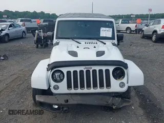 2017 Jeep Wrangler Unlimited Sahara with VIN 1C4HJWEG3HL505307, listed as a IAAI auction lot 42497015 with 92,790 mi miles and . Bid and sale history available at DreamBid. Image 12.