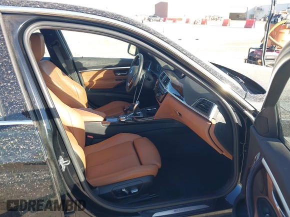 2017 BMW 3 Series 330e iPerformance with VIN WBA8E1C34HA156688, listed as a IAAI auction lot 41753490 with 74,130 mi miles. Bid and sale history available at carsss.com. Image 5.