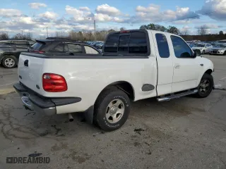 2003 Ford F-150 XL with VIN 1FTRX07243KA29505, listed as a Copart auction lot 79263674 with 188,516 mi miles and Salvage Title. Bid and sale history available at carsss.com. Image 3.