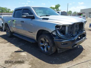 2021 Ram 1500 Big Horn with VIN 1C6SRFFT9MN577936, listed as a IAAI auction lot 42289796 with 98,277 mi miles and . Bid and sale history available at DreamBid. Image 1.