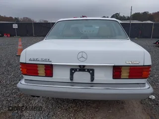1989 Mercedes-Benz 420 Series 420SEL with VIN WDBCA35E4KA456613, listed as a IAAI auction lot 41145650 with 199,599 mi miles. Bid and sale history available at carsss.com. Image 16.